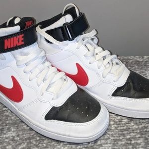White, red, and black Nikes
